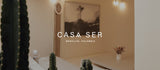 Interior de Casa SER en Medellín, espacio de SER by Andrea Agudelo